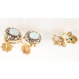 Two pairs of opal earrings.