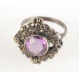 A marcasite and amethyst ring.