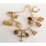 A 9ct gold charm bracelet, 32g.