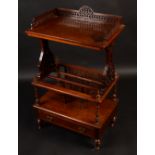 A high Victorian walnut Canterbury whatnot,