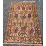 A West Persian rug, the ivory field with an all over design of guls,