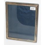 A modern silver mounted large picture frame.