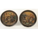 A pair of Johann Maresch Musterschutz pottery plaques, diameter 33cm.