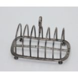 A silver William Hutton & Sons Ltd seven section toast rack, London 1898, 4.8oz.