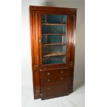 A mahogany breakfront bookcase,