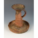 A rare late 18th or early 19th century Cornish Pottery Pilchard Oil wick lamp or chill, height 20.