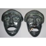 Two pottery Greek style death masks, height 23.5cm, width 19cm.