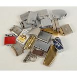 A collection of twenty pocket lighters, including a red Savoy lighter, The Bedford 'Bijou' lighter,