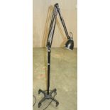 A Herbert Terry black painted floor standing anglepoise trolley lamp, extended height 193cm.