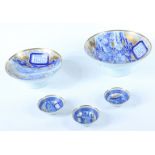 A set of five Chinese blue and white gilt decorated bowls,
