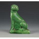 A rare 18th century Whieldon type pottery of a seated Pug dog, with overall green glaze, height 8.