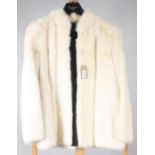 A lady's white mink fur coat, labelled 'Elizabeth of Rochdale',
