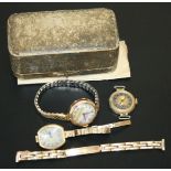 Three ladies gold cased watches, two with gold bracelets.