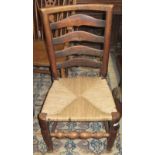 A 19th century ladderback dining chair, height 93cm, width 48cm.