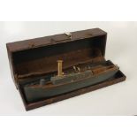 A model of a Naval pinnace, length 60cm. with wooden case.
