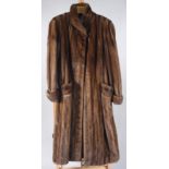 A lady's demi buff full length fur coat, chocolate brown satin lining, size 12/16,
