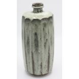 Attributed to David Leach, a tall cut sided stoneware vase with narrow neck,