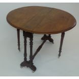 A Victorian oval walnut Sutherland table, on spiral turned supports, width 82 x 93cm.