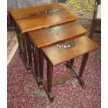 A Chinese hardwood nest of three tables, inlaid with mother of pearl, height 57cm, width 55cm,