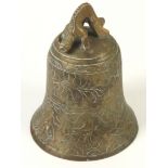 A brass temple bell, height 20cm, diameter 15cm.