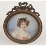 A painted portrait miniature, indistinctly signed.