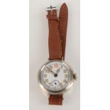 A nickel trench cased wristwatch, the white dial with luminous numerals and hands,