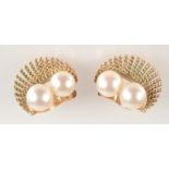 A pair of 14ct gold 1950s clip on earrings each with two cultured pearls.
