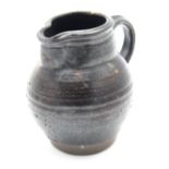 A traditional pottery jug, from the earliest days of the Leach Pottery, faint pottery mark,