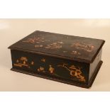 A chinoiserie lacquered lace box, in early 18th century style height 15cm, width 48cm, depth 33cm.