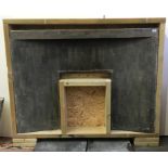 A Delabole slate fireplace, 1946, by Naum Gabo (1890-1977), height 102cm, width 137.5cm.