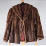 A dark brown mink coat, with burgundy silk lining, label inscribed 'Alijoo,