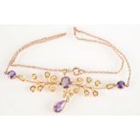 A Belle Epoque amethyst and pearl set gold necklace.