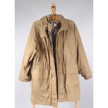 A lady's Aquascutum 3-in-1, hooded coat, pale outer shell with 100% cotton novo check quilt lining,