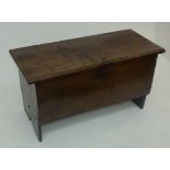 A 17th century oak boarded small chest, width 85cm.