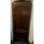A George III oak standing corner cupboard,