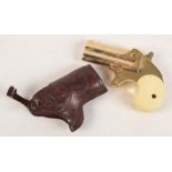 An Italian Derringer gilt metal starting pistol, impressed 'Starter Cal.6mm.