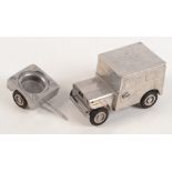 A German table cigarette lighter in the form of a WW2 jeep and trailer, inscribed Ges.
