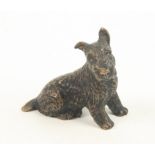 A bronze model of a Scottie dog, height 5cm, width 5.5cm.