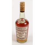 A bottle of JAs. Hennessy & Co Bras Arme Cognac, height 28cm.