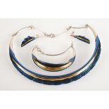 A contemporary silver gilt and blue enamel suite.