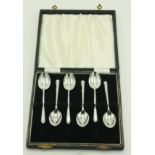 A set of six silver Art Deco coffee spoons, cased,