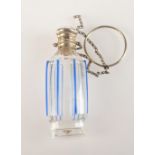 A cut glass 19th century silver mounted perfume bottle with blue overlay lines with silver finger
