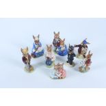 Eight Royal Doulton Bunnykins figures.