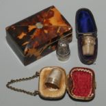 A 19th century tortoiseshell veneered case for three thimbles,