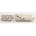 A plain two section silver stamp envelope and a single section silver stamp envelope each with