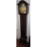 A mahogany grandmother clock, 20th century, the door with a shaped glass panel, two keys,