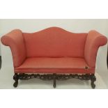A magnificent sofa upholstered in coral damask in William and Mary style,
