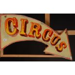 A small 'Circus' sign in the shape of an arrow, maximum width 70cm.
