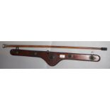 A mahogany wall mounted coat rack, early 20th century, with five metal hooks,