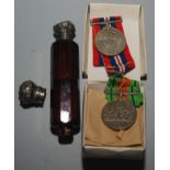 A double ended Victorian perfume bottle and two WWll medals.